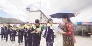 从芙蓉花到格桑花 见证梦想花开——记温江对口支教老师陈安宇