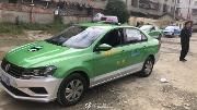 温江区出租车统一换上了“绿装”
